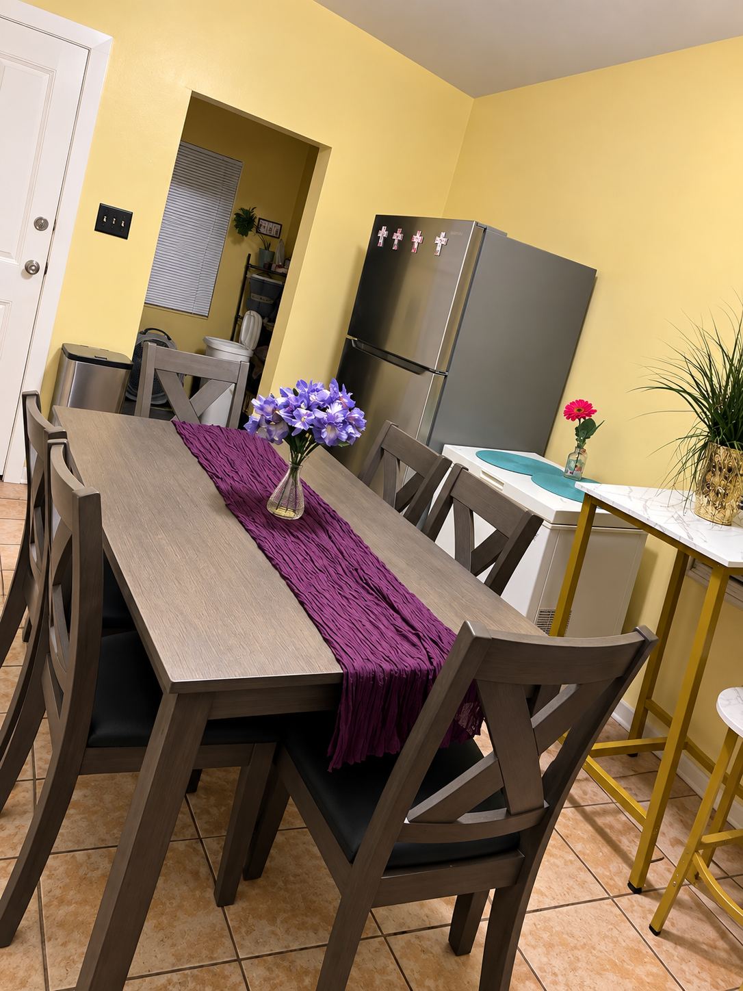 Open kitchen and dining room with bright, modern finishes